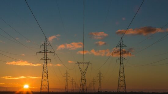 Power pylons at sunset